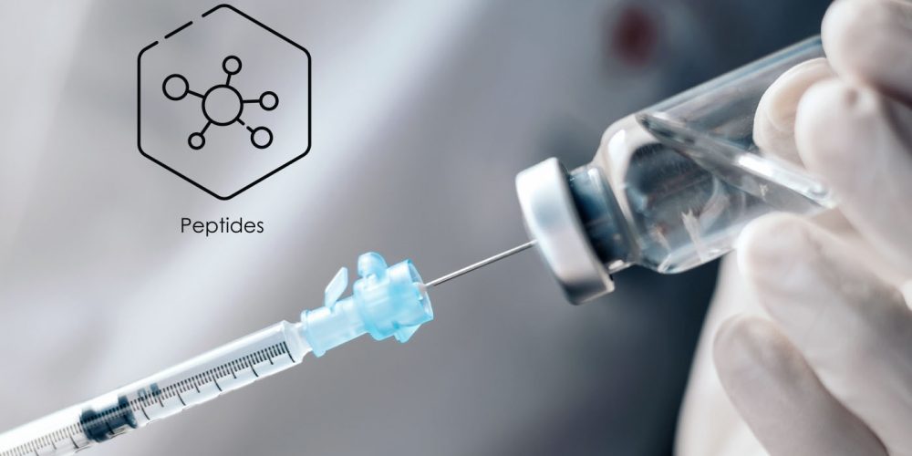 Licensed RN preparing a peptide injection in a sterile clinical setting at iCRYO Boca Raton